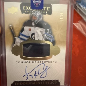 2023-24 UD THE CUP EXQUISITE CONNOR HELLEBUYCK JERSEY PATCH AUTO 34/50 - JETS - Picture 1 of 3