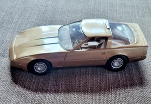 1986 ERTL AMT Corvette Metallic Gold Dealer Promo Plastic Model Car - Picture 1 of 6