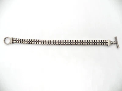 Brazalete de tenis envolvente tono plata a cuadros firmado por Kenneth Cole raro para mujer Foto 1 de 4