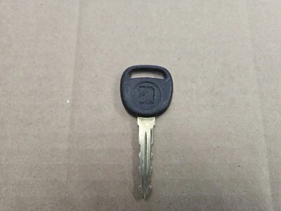 Saturn OEM Factory Black & Chrome Ignition Door Key - Image 1 of 2