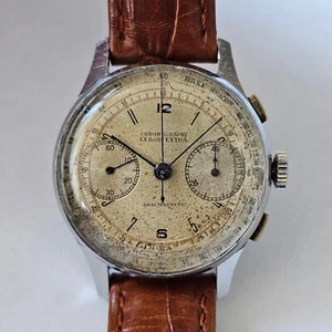 LEBOIS EXTRA-ANNI 40-CRONO-RUOTA A COLONNE-BITONALE-36 MM-ACCIAIO-LANDERON 39 - Imagen 1 de 24