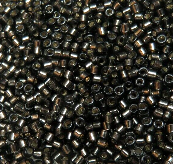 11/0 DELICA ~ S/L GRIS OSCURO ~ DB 613 ~ 7 gramos ~ CUENTAS DE SEMILLAS DE VIDRIO MIYUKI Foto 1 de 1