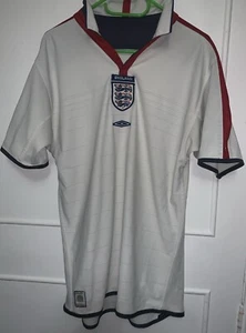 MAGLIA MAGLIA CALCIO HOME INGHILTERRA 2003/2005 EURO 2004 REVERSIBILE UMBRO MEDIA - Foto 1 di 13