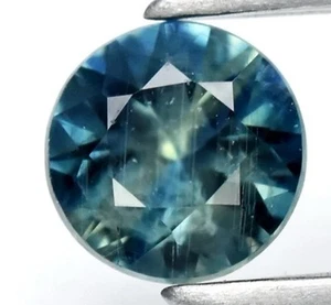 Saphir d’Auvergne 0.19ct bleu/vert taille rond brillant - Imagen 1 de 1