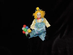 Vintage clown Joker holding balloons. - Picture 1 of 10