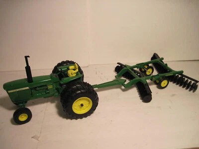 Tractor de juguete agrícola John Deere "4320 diésel" con disco Ertl 1/16 nuevo en caja Foto 1 de 4