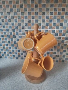 set 7 yellow mugs Coffee 8CM DIAMETER X 9.5CM HIGH on mug tree holds 6 - Picture 1 of 6