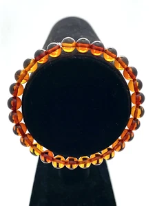 Natural Cognac Baltic Amber 7.3" 6.7mm Gemstone Bead Bracelet w/Stretch Cord - Picture 1 of 2