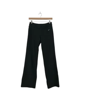 Pantalones Nike Dri-FIT para mujer pequeños negros acampanados pierna yoga ropa deportiva elástica gimnasio - Imagen 1 de 4