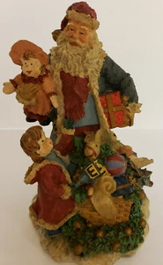 Santa Claus in Blue Coat surrounded wtih toys and Little girl in red coat,(SC26) - Picture 1 of 3