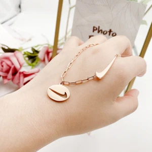 Punk Unisex Titanium Name Sign Hook Nike Symbol Pendant Gold/Rose Gold Necklace - Picture 1 of 4