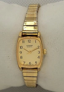 Ladies Sharp Classic Tank Rectangle Gold Tone Stretchy Bracelet Analog Watch I4 - Picture 1 of 8