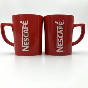 Juego de 2 tazas rojas Nescafé con logotipo de doble cara taza de café 2x diferentes 11 oz - Imagen 1 de 8