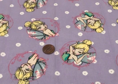 Tinkerbell *White Flowers*on Lavender *Springs Creative *100% Cotton *8" x  21" - Image 1 of 4