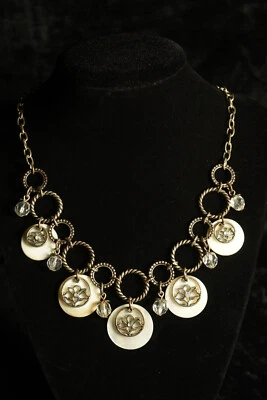 Vintage "Avon" signed bib necklace with shell, glass, and metal flower accents - Image 1 of 4