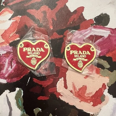 Lot Of (2) PRADA Charms/Hearts/ Gold Tone And Red/ Stamped/ Excellent Condition - Image 1 of 4