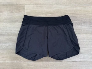 Ivivva Girls Running Shorts Size 12 Black Zip Pocket Sports Outdoor Lululemon 4" - Picture 1 of 8
