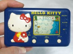 Hello Kitty Seaside Holiday /  Tomy / VINTAGE Game watch　/80's game