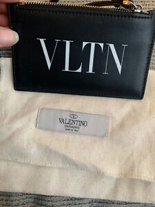 Black with VLTN written in white valentino garavani card holder