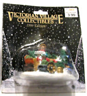 Victorian Village Collectibles 1999 edition Holly Cart and salesman figurine