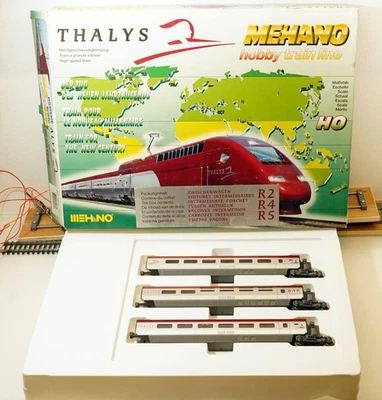 MEHANO T 676 AC ECHELLE HO 1/87 THALYS COFFRET 3 VOITURES INTERMEDIAIRES + BOITE - Imagen 1 de 4