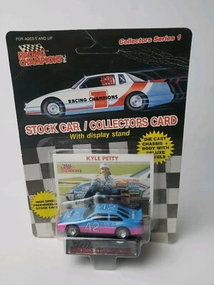 1989  #42 KYLE PETTY - PLASTIC TIRE - BLUE & PINK - ERROR CAR  #1270             - Image 1 of 4