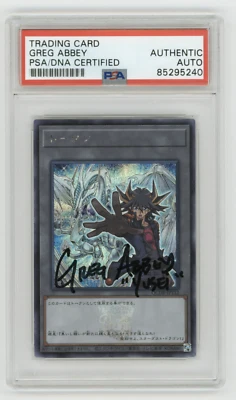 PSA Signed Greg Abbey Yu-Gi-Oh! Token QCDB-JPT12 Yusei and Stardust Dragon - Image 1 of 2