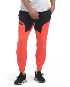 Joggers uomo Under Armour corallo/nero in pile inarrestabile 2XL nuovo con etichette - Foto 1 di 2