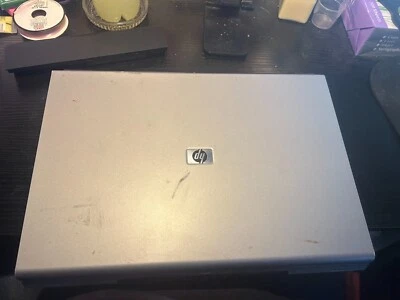 HP PAVILION ENTERTAINMENT NOTEBOOK SPECIAL EDITION DV1000 LAPTOP *FOR PARTS* - Image 1 of 4