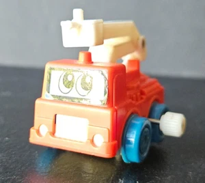 TOMY WIND UP TOY FIRETRUCK. EXTENDING BUCKET. RED, WHITE, BLUE. - Picture 1 of 8