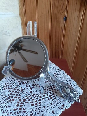 ancien miroir face à main en métal argenté - Photo 1/4