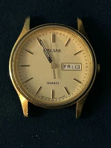 Reloj Pulsar Vintage 34mm Tono Dorado V533-7A30 Día/Fecha Funcionando - Imagen 1 de 2