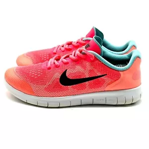 Sneaker da corsa atletica Nike Free RN Racer rosa e bianca al neon taglia 6Y - Foto 1 di 10