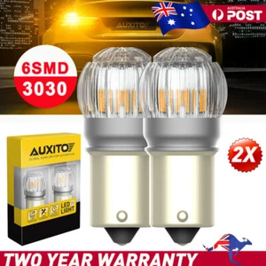 2 LED 1156 Light Bulb Brake R5W BA15S Turn Reverse Tail Stop Amber Globe AU/24V - Picture 1 of 8