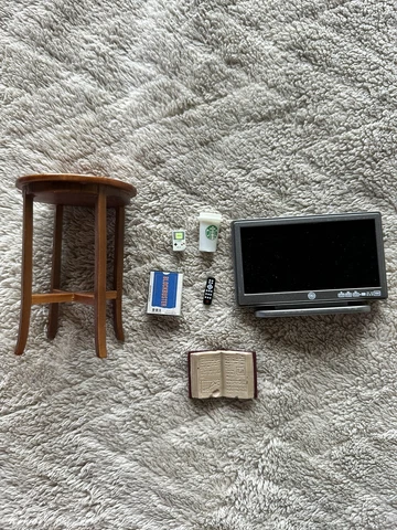 Marvel Legends fodder: Starbucks, TV, Book, Chair, Blockbuster VHS Cover