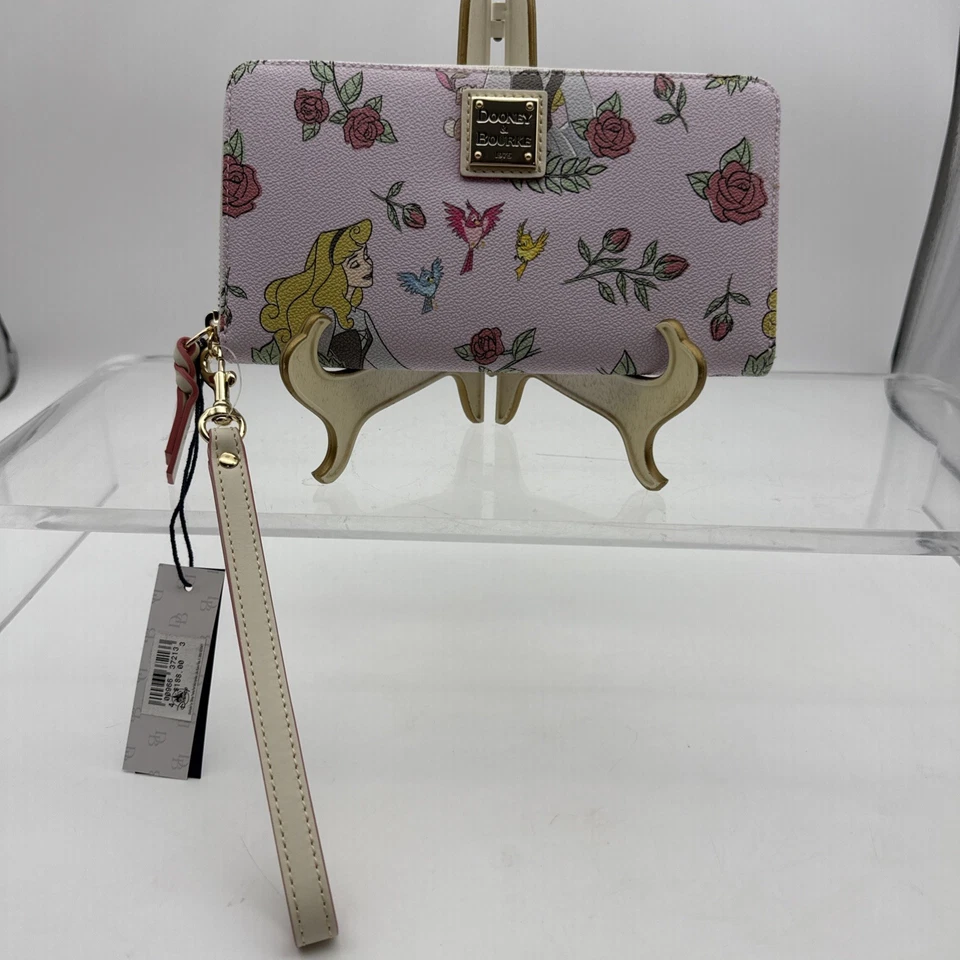 NUEVO CON ETIQUETAS 2024-Disney Dooney & Bourke Bella Durmiente 65 Aniversario Cartera Muñequera Foto 1 de 4