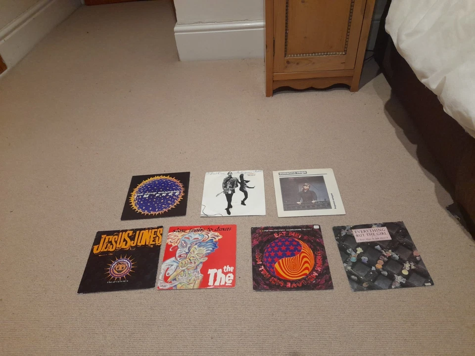 Collection of 7 Indie Rock 7" vinyl Records The The Jesus Jones Suzanne Vega - Image 1 of 1