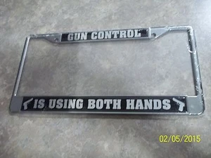 GUN CONTROL IS USING BOTH HANDS LICENSE PLATE FRAME NEW in plastic LOOK & BUY! - Bild 1 von 1