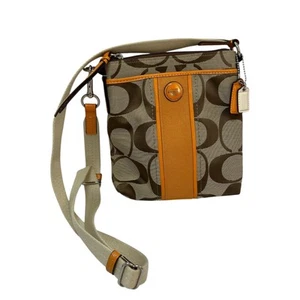 Bolso Bandolera Coach Signature Lona Cuero Borde Swingpack Lona Tostado Naranja - Imagen 1 de 16