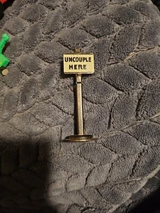 O / O27 Ga Marx Tin Metal "Uncouple Here" Trackside Sign Model Train Railroad RR - Picture 1 of 4