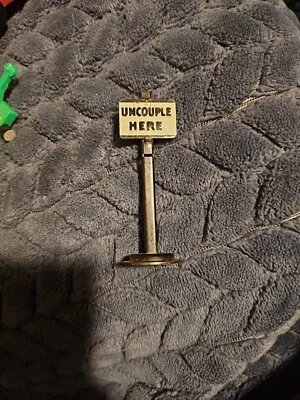 O / O27 Ga Marx Tin Metal "Uncouple Here" Trackside Sign Model Train Railroad RR - Image 1 of 4