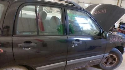 Chevy Geo Tracker 2000 pasajero puerta delantera derecha conjunto regaliz negro Wa990A Foto 1 de 4