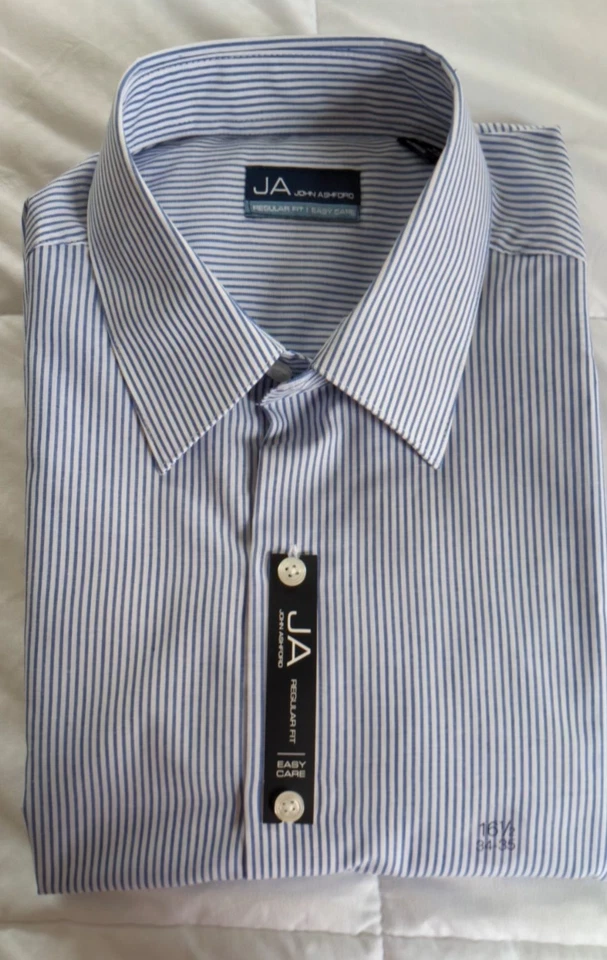 Camisa JA John Ashford, Nueva con Etiquetas, Talla 16.5, Blanca con Rayas Azules. Cuidado fácil, ajuste regular Foto 1 de 4