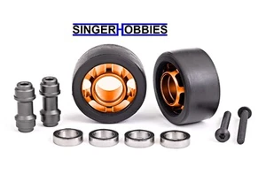 Traxxas 7775T Wheelie Bar Wheels Aluminum Orange-Anodized XRT/SLEDGE/MAXX TRA1 - Picture 1 of 2