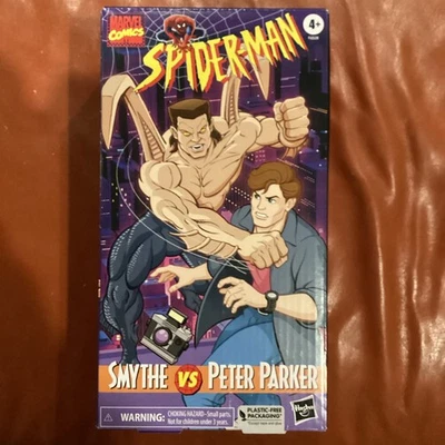 Hasbro Marvel Legends Smythe vs Peter Parker Spider-Man VHS Paquete de 2 Foto 1 de 4