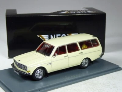 (KI-01-37) Neo Scale Models 43090 Volvo 145 Kombi weiß mit Hund in 1:43 in OVP - Bild 1 von 2