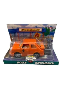 Chevron Cars HOLLY HATCHBACK w/ Dog & Cart -Eyes Move-Doors Open 1997 Orange NOB - Picture 1 of 10