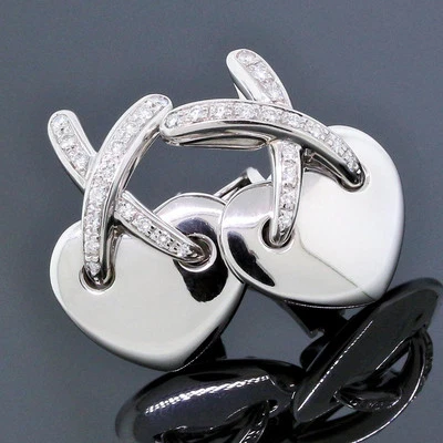 Pendientes con clip Chaumet Paris de oro blanco de 18 quilates con diamantes X graens cruzados Foto 1 de 4