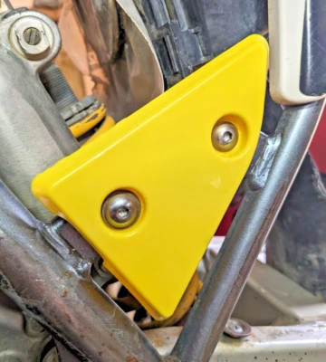 2008 - 2025 Suzuki DRZ125 DRZ 125 Frame Foot Guards 43571-08G00 - Image 1 of 3