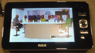 RCA DPTM70R COLOR LCD HANDHELD 7"  MINI TV NEW BATTERIES EX COND - Image 1 of 4